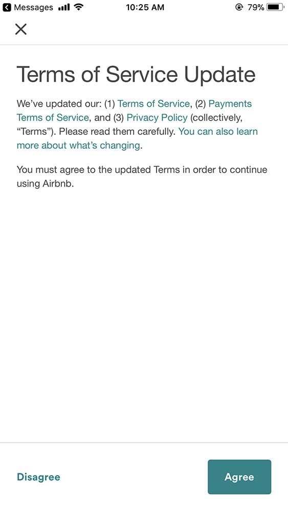 Airbnb: Mobile app Terms of Service update notification screen with clickwrap &quot;Agree&quot;