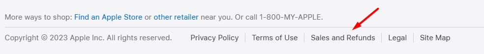 Apple website footer with Sales and Refunds link highlighted